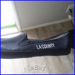 Offical Los Angeles County Jail inmate shoes worn by a man serving his sentence